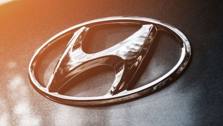 Hyundai logo with orange light