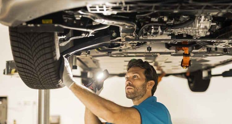 Automotive mechatronics technician inspected